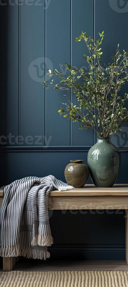 Vase with blooming branch of apple tree on wooden shelf in room photo