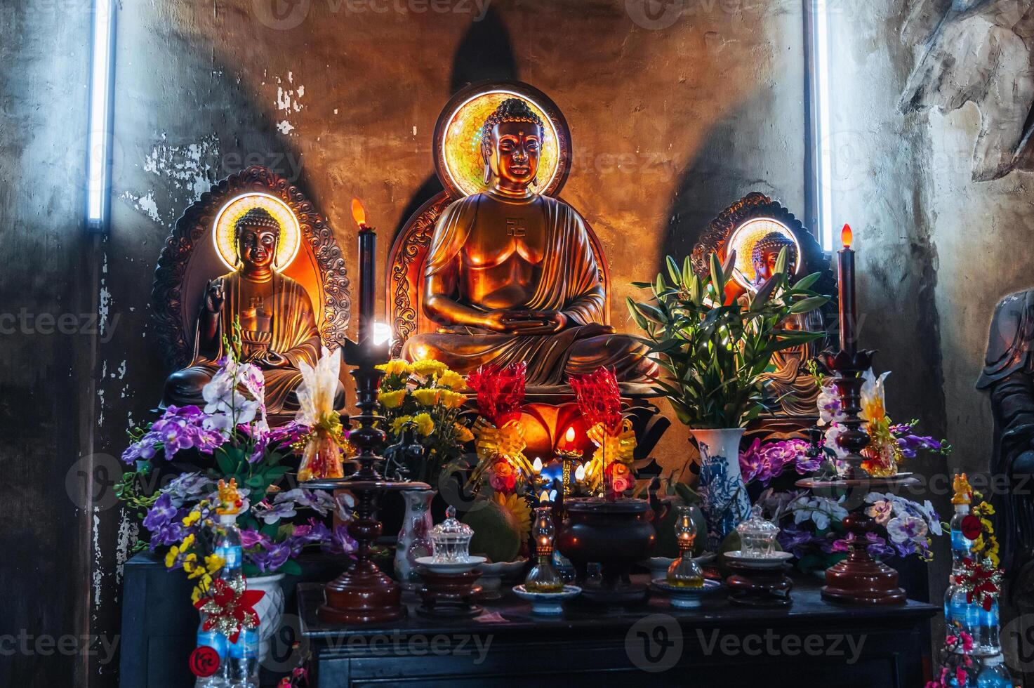Buddha statues inside temple at Long Son Buddhist Pagoda in Nha Trang in Vietnam photo