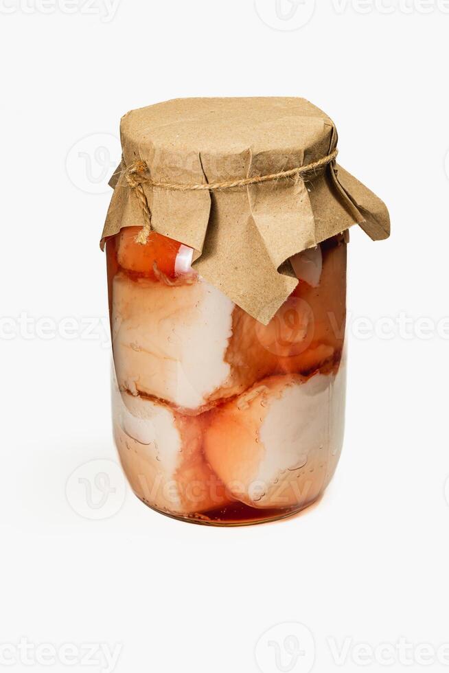 Homemade pickled lard with salted beans in a jar for preserving meals photo