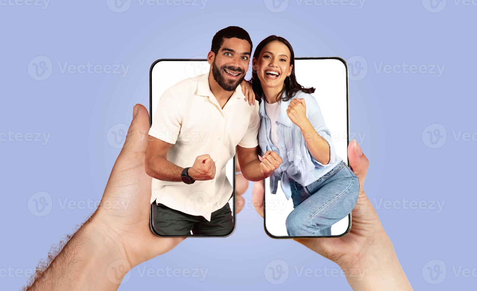 A cheerful couple connects through their smartphones, highlighting their deep bond and modern communication. Their joyful expressions reflect affection and togetherness in a digital age. photo