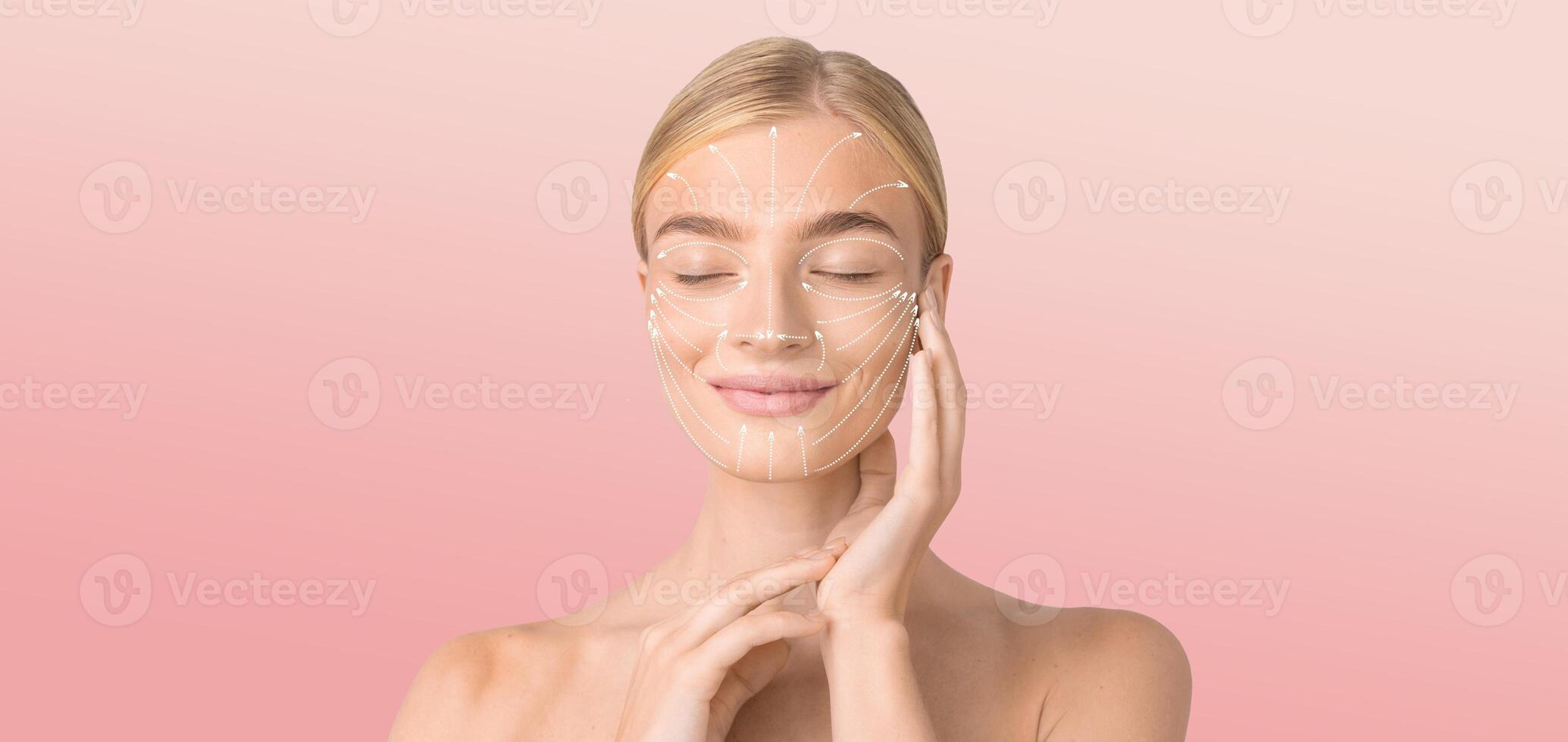 A woman is pampering herself with a skin care routine, gently applying a product to her face. The background is soft and isolated, perfect for a moment of relaxation and self-care. photo