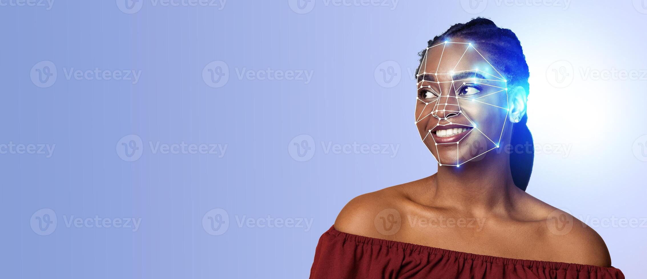 A young woman smiles with a digital overlay of facial recognition technology on her face. This futuristic approach highlights the advancements in identification and security. photo