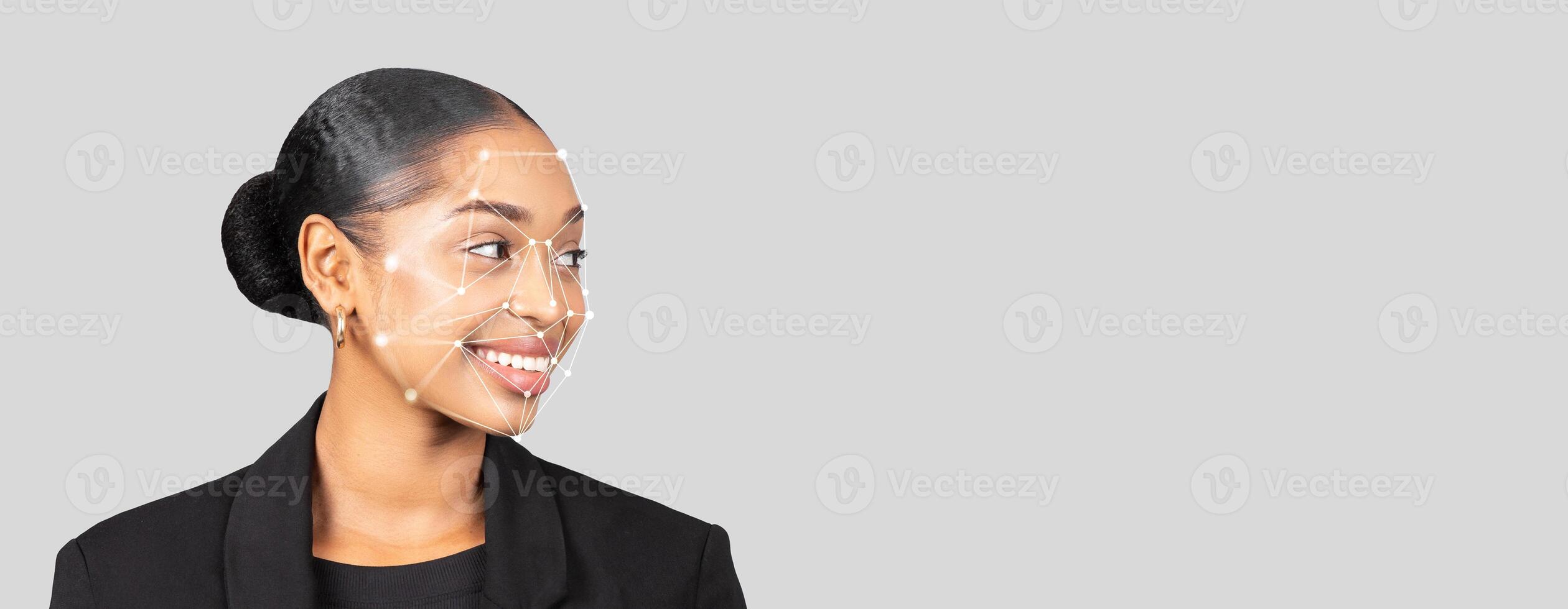 A professional woman is highlighted for facial recognition technology. The concept showcases the identification process, featuring clear facial mapping points against a neutral background. photo