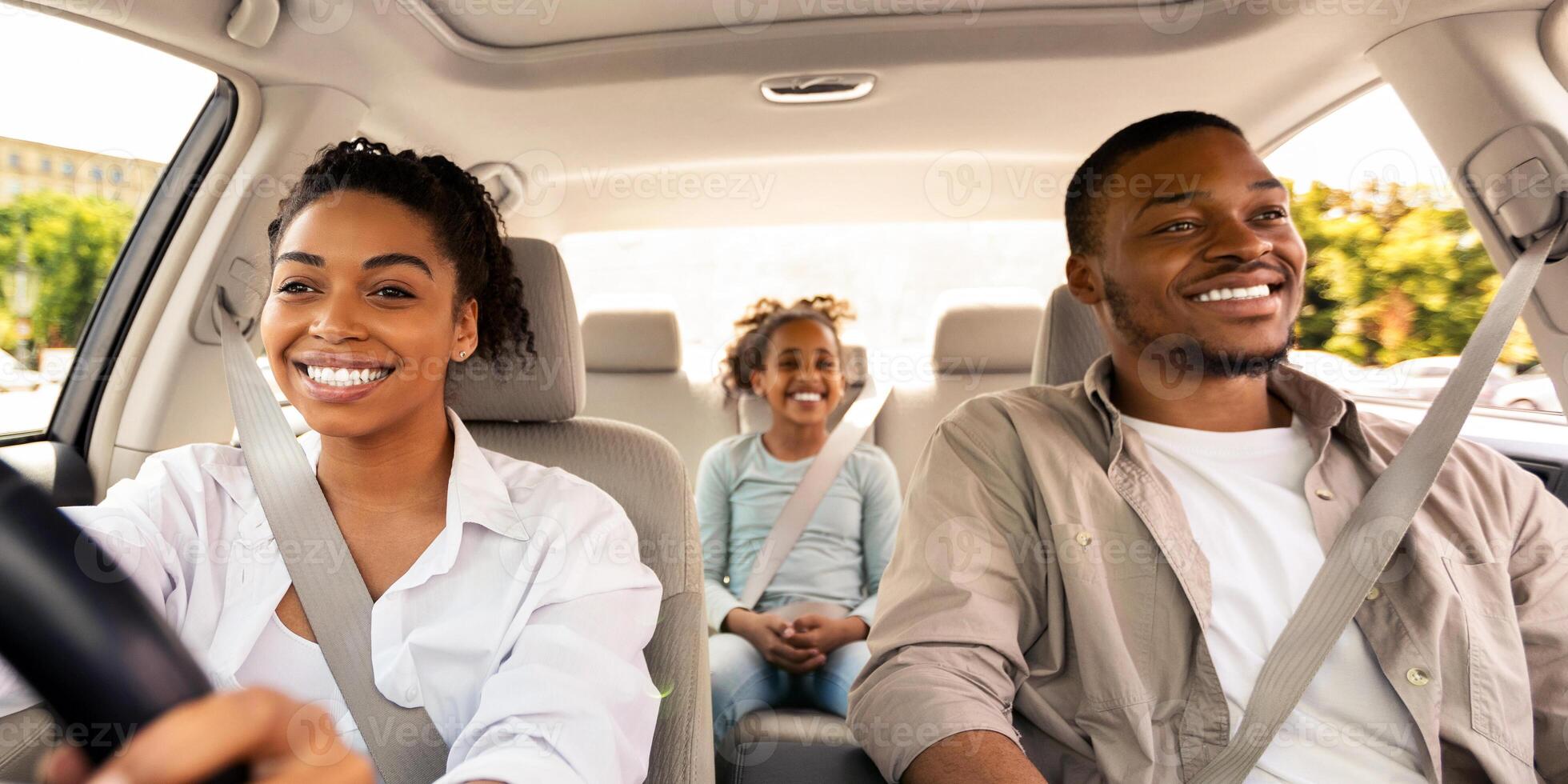 Family Having Car Ride, Woman Driving Enjoying Road Trip With Husband And Daughter On Summer Vacation. Auto Leasing And Purchase. Transportation And Traffic Concept. Selective Focus photo