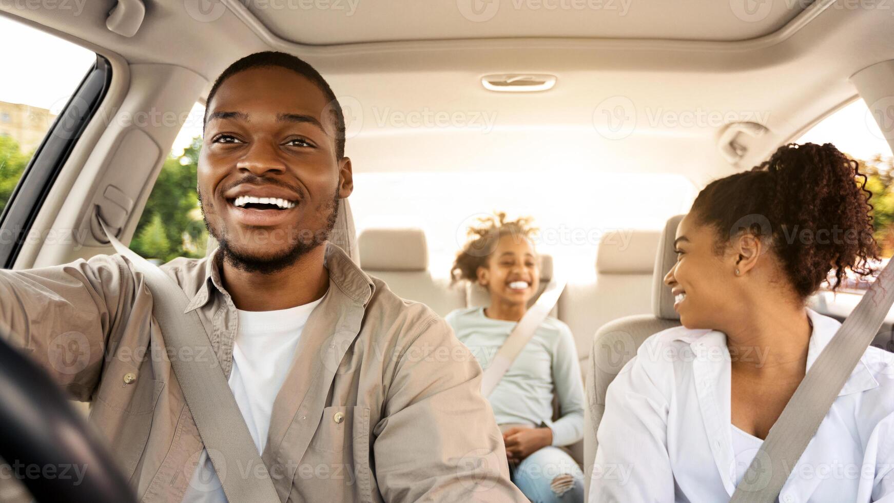 Car Ownership. Happy Black Parents And Daughter Sitting In Auto During Road Trip In Summer. Family Traveling By Automobile. Vehicle Purchase And Leasing. Selective Focus photo