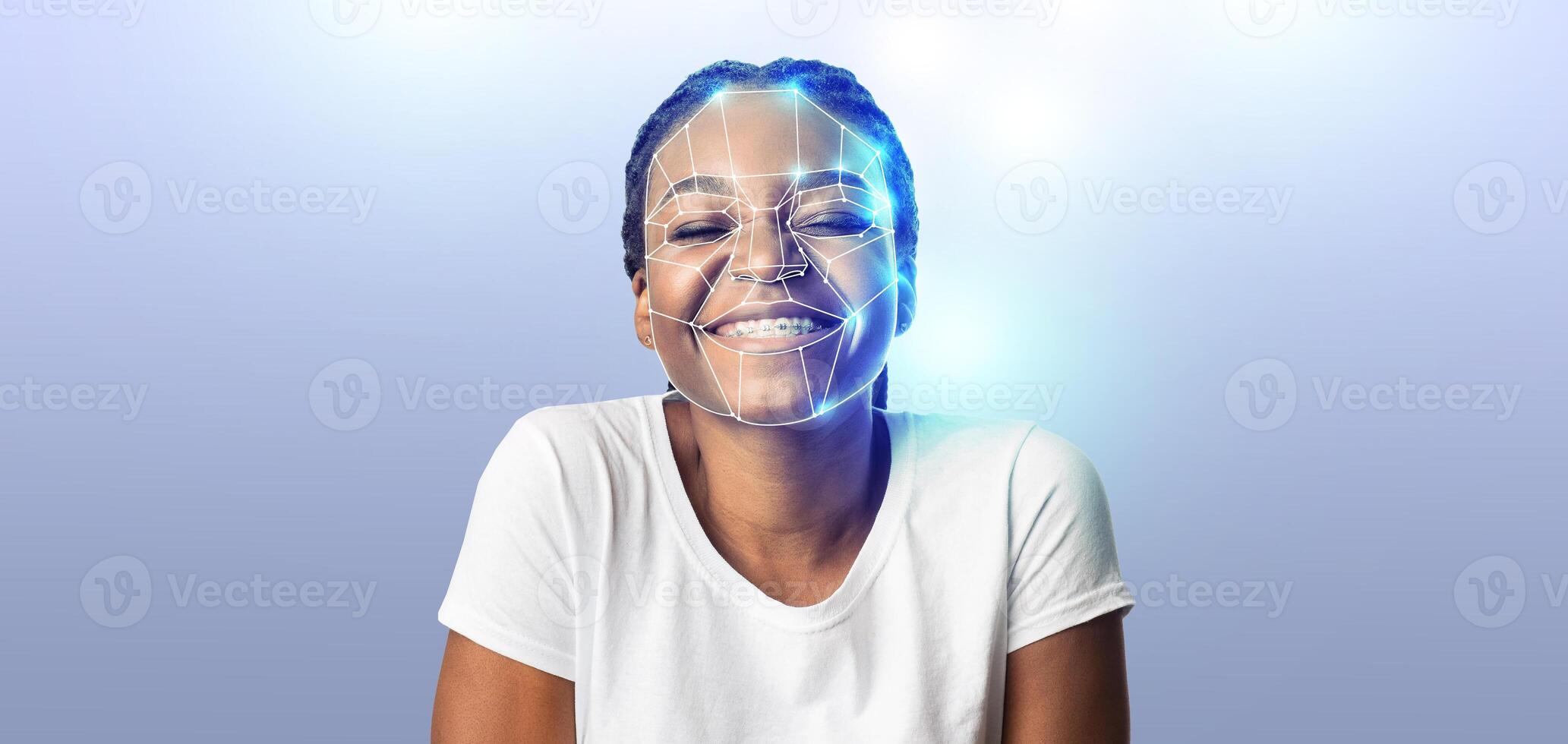 A person smiles while facial recognition technology is illustrated on their face. photo