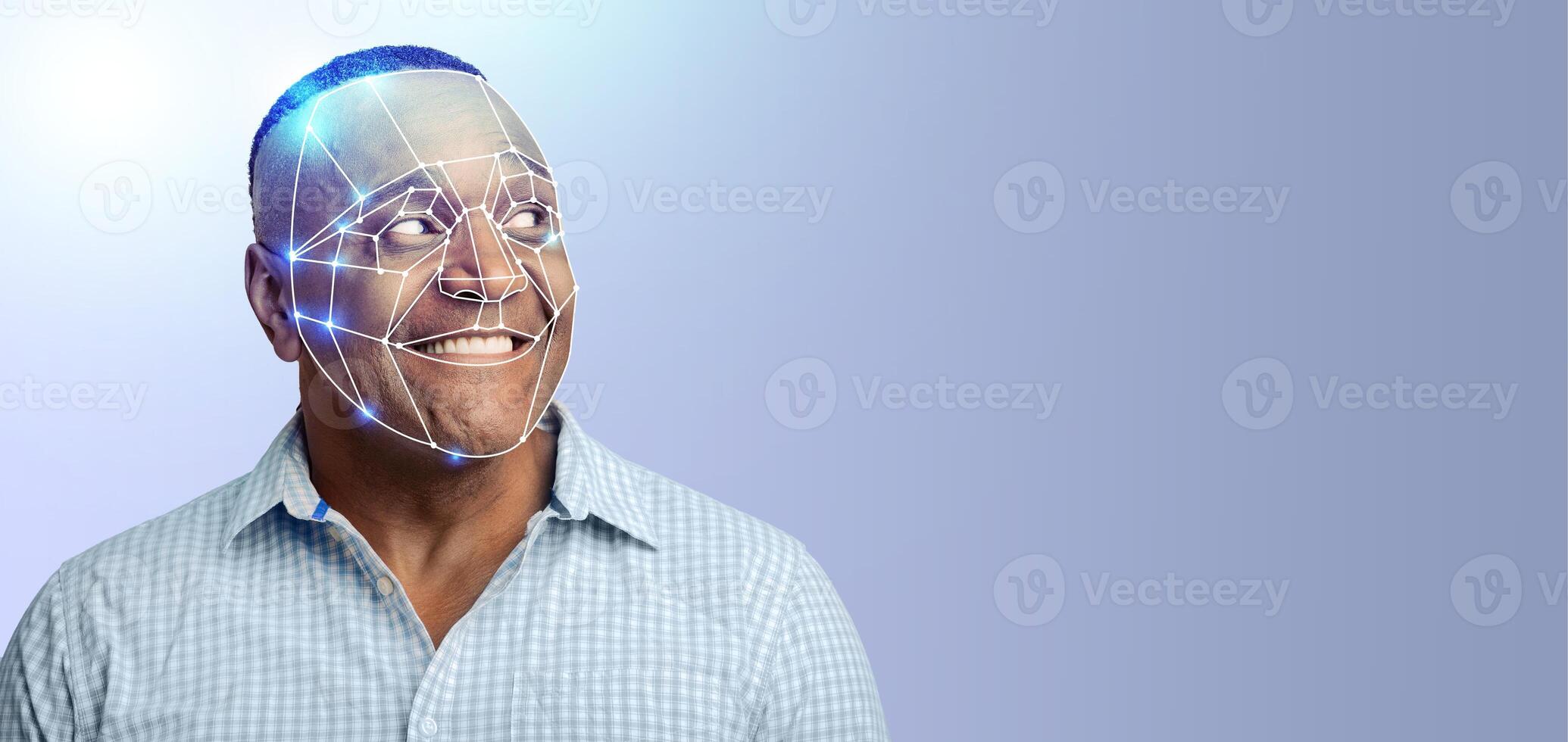 A person with a smile displays facial recognition technology on their face. This modern method illustrates the capabilities of advanced identification systems in a minimalist environment. photo