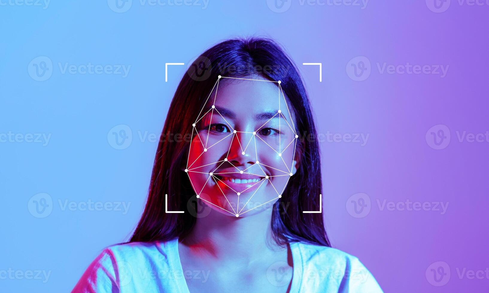 A woman smiles as facial recognition technology maps her features against a vibrant background. The process highlights the intersection of technology and human expression in modern identification. photo
