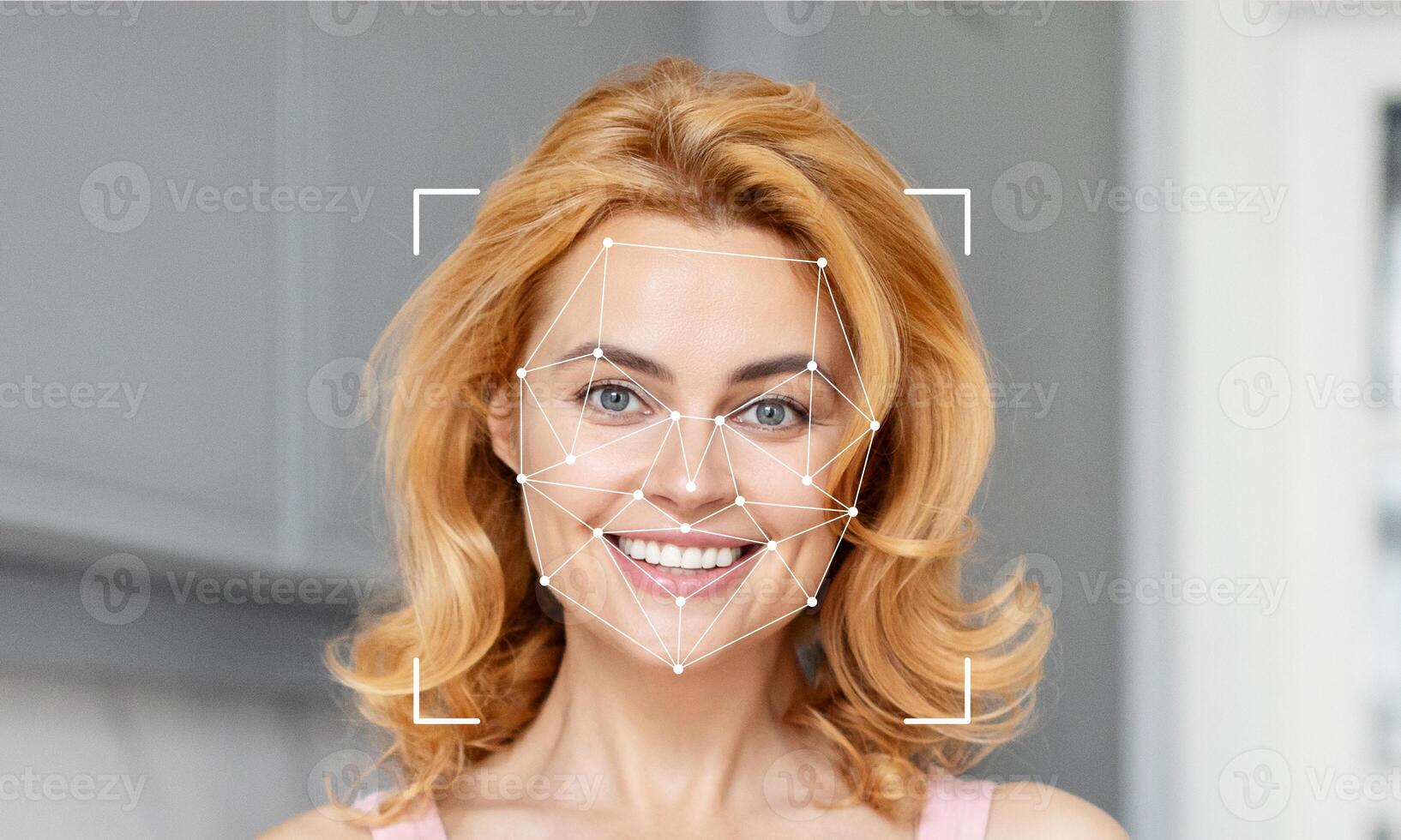 A woman with blonde hair smiles brightly while facial recognition technology highlights her facial features against a blank background. This moment demonstrates modern identification techniques. photo