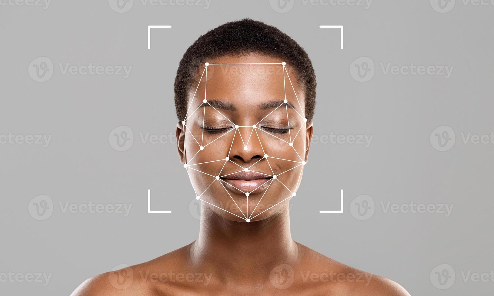 A person with closed eyes shows a calm expression as a facial recognition overlay highlights unique facial features. The background is neutral, emphasizing the subject and technology used. photo