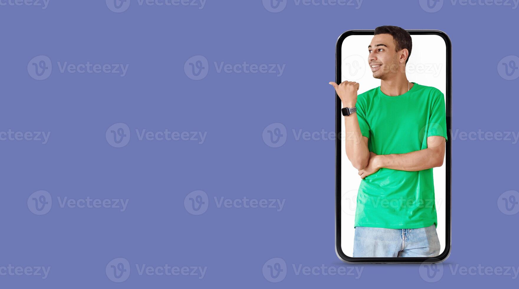 A person is pointing towards their smartphone, showcasing a large screen displaying social media applications. The setting features an isolated background that emphasizes the technology involved. photo