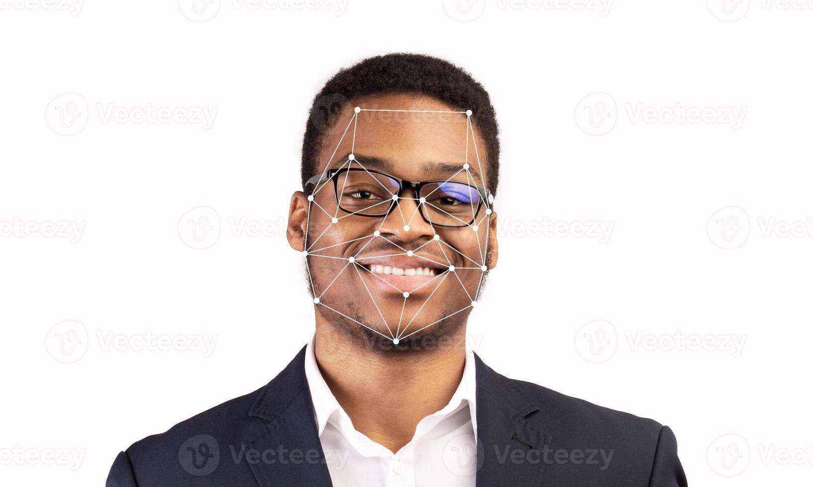 A smiling individual displays advanced facial recognition technology. This showcases the intersection of personal identification and modern technology in a neutral space. photo