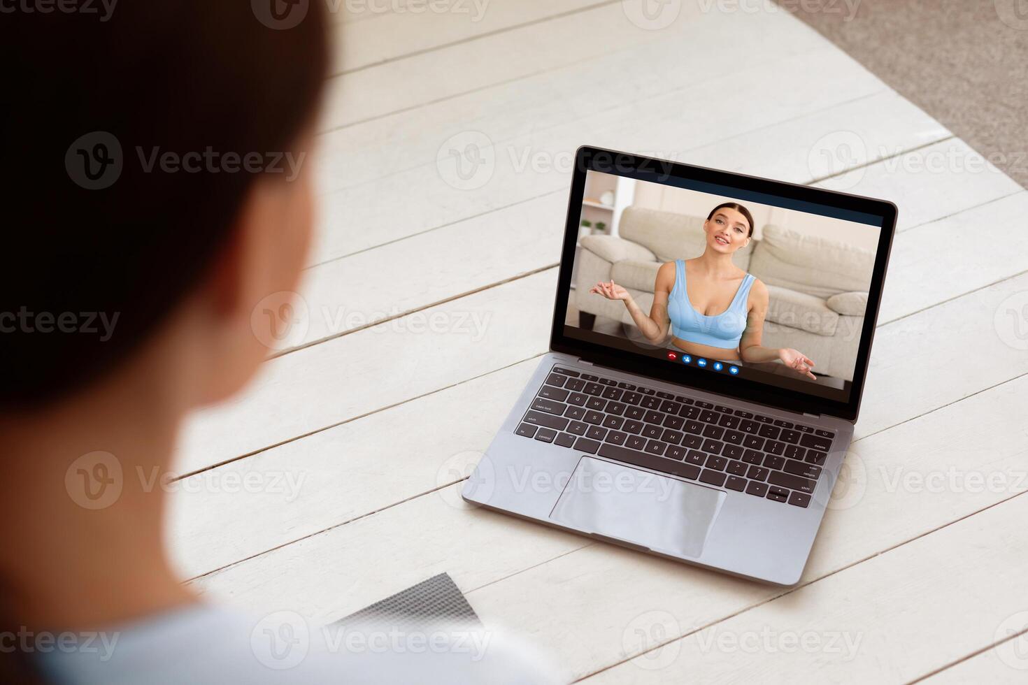 Girl Watching Online Fitness Blog On Laptop Exercising At Home. Stay Fit Concept. Back View, Selective Focus photo
