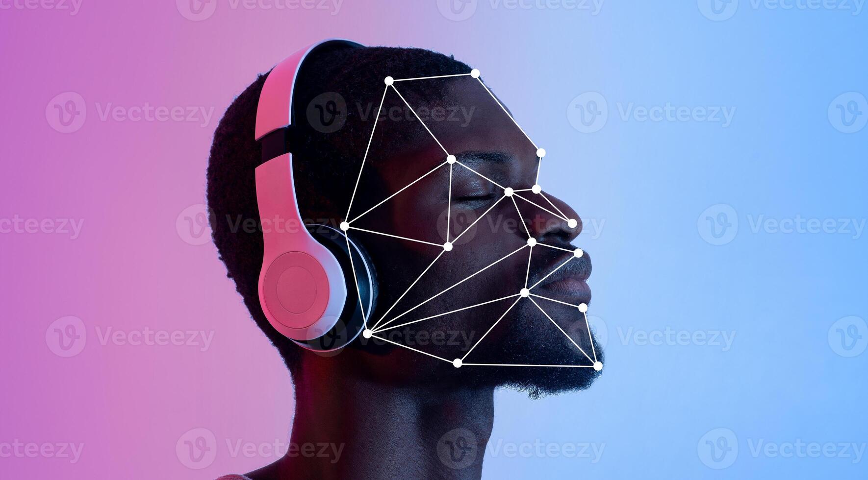 A person wearing headphones listens attentively while undergoing facial recognition analysis. The colorful background highlights the intersection of technology and identity verification. photo