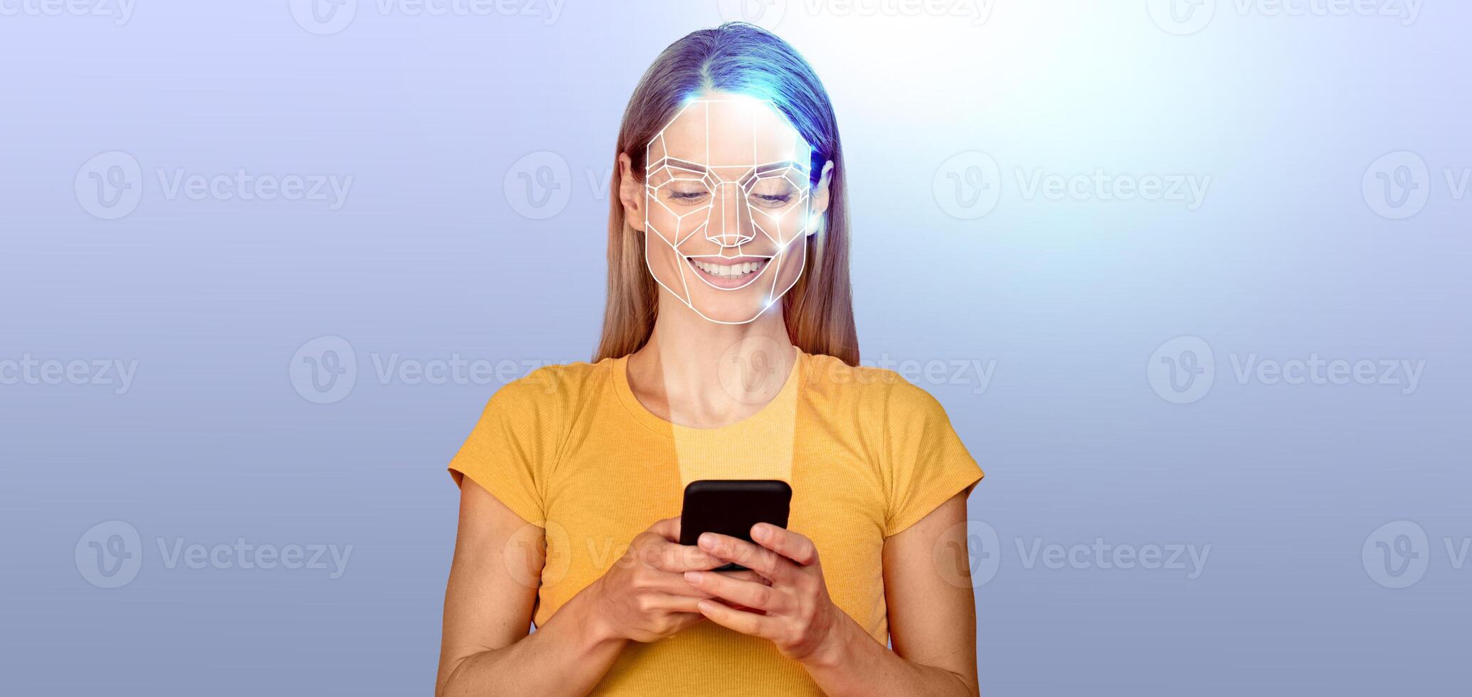 A person stands isolated, engaging with their smartphone while facial recognition technology scans their face. The background is an empty gradient, emphasizing the tech interaction. photo