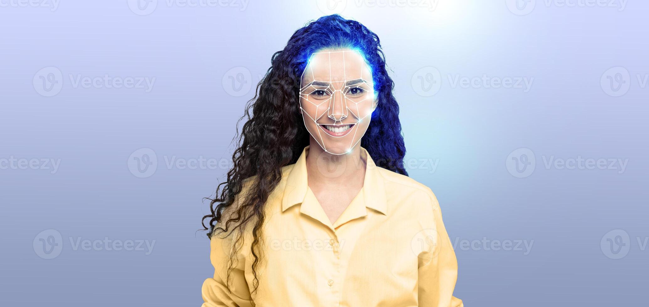 Portrait of a cheerful individual with curly hair, demonstrating modern facial recognition technology on a plain background. The scene highlights digital advancements in identity verification. photo