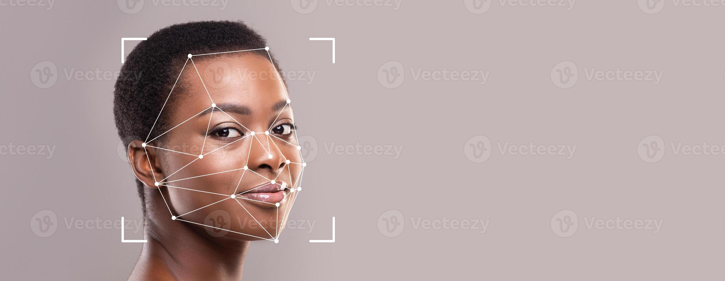 A woman with short hair is highlighted by facial recognition technology. The geometric lines on her face indicate a detailed identification process against a neutral background. photo
