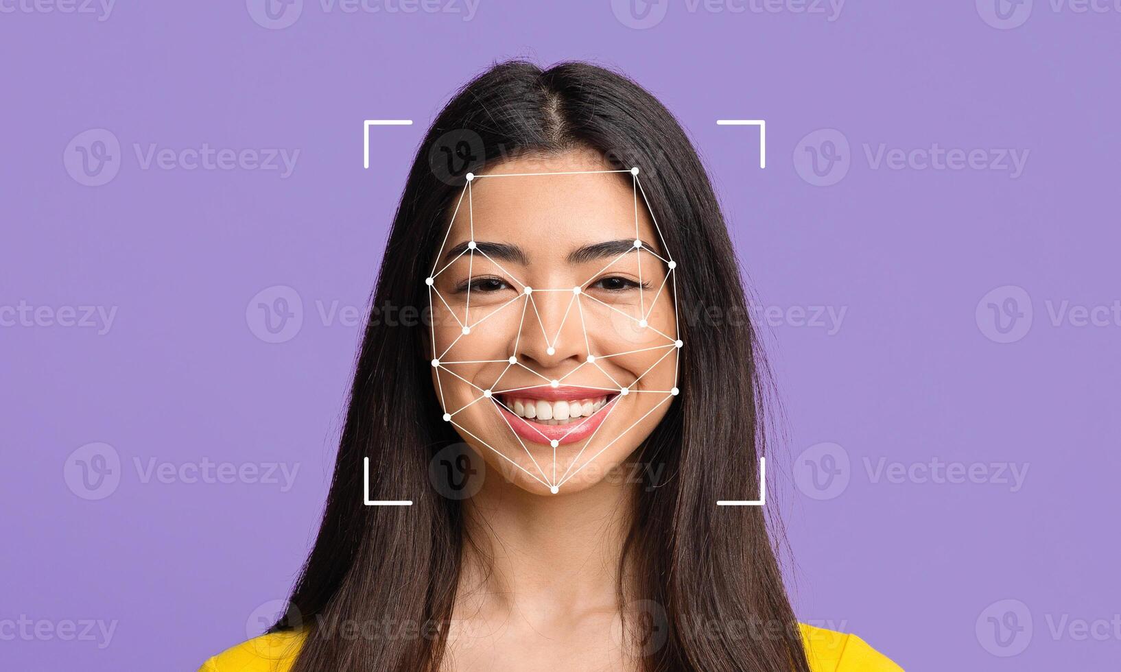 A young woman smiles confidently as facial recognition technology overlays geometric lines on her face. This depiction highlights advances in ID identification and recognition methods. photo