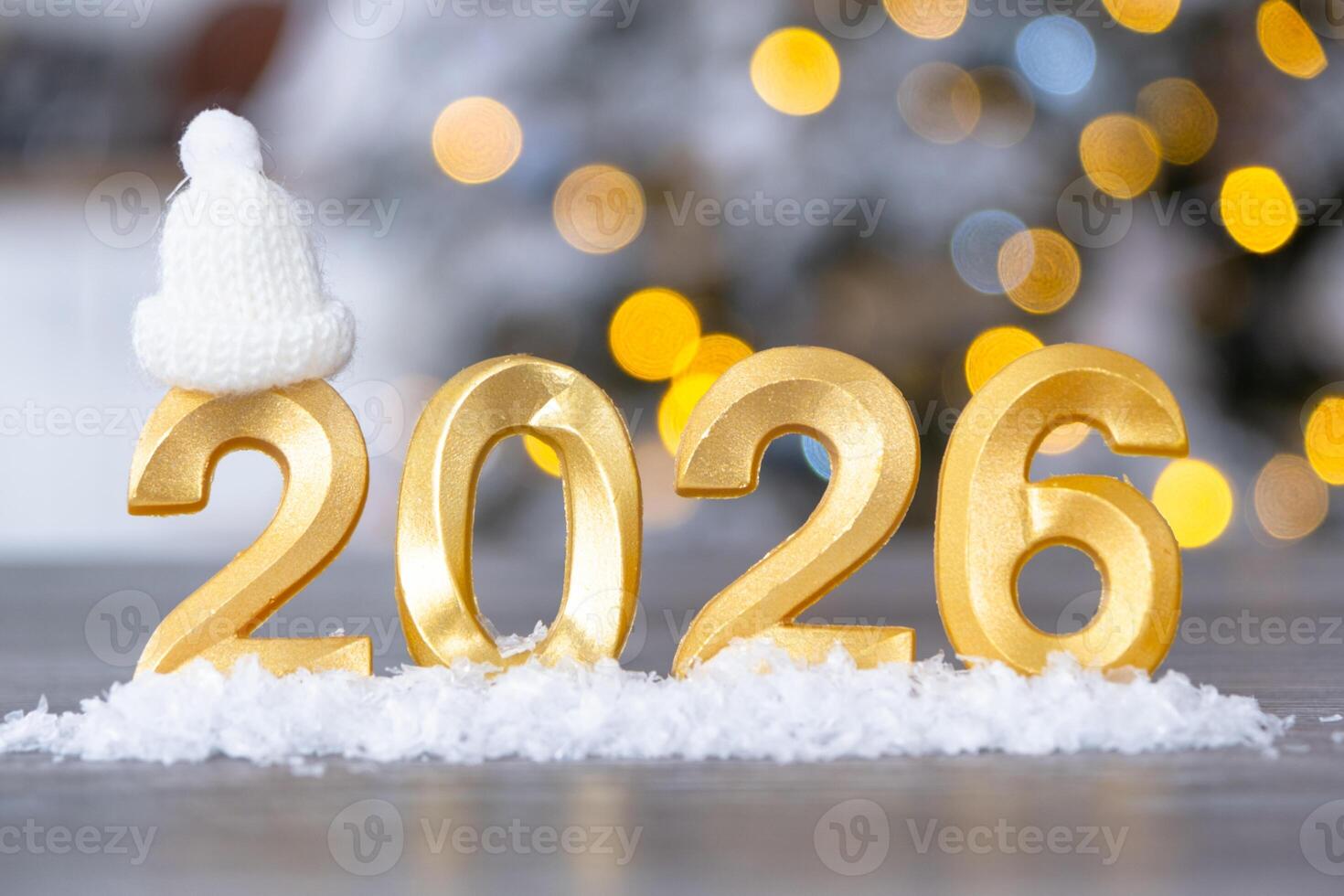 Golden figures number 2026 New Year background of fairy light, snow and garlands. Greeting card, Happy New Year, cozy home photo