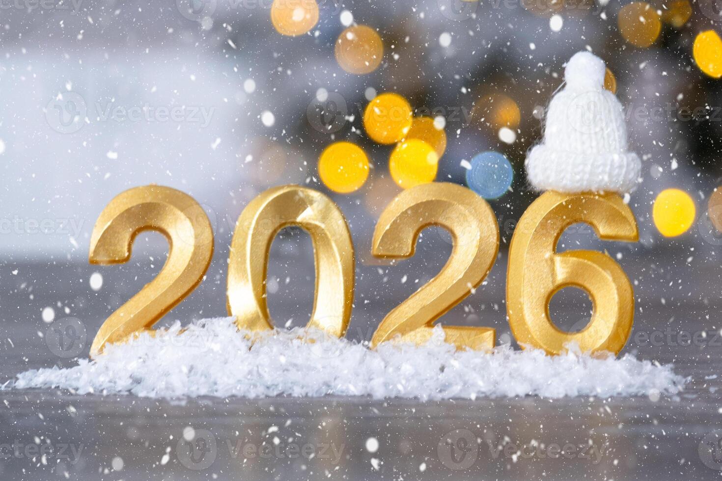 Golden figures number 2026 New Year against the background of fairy light, snow and garlands. Greeting card, Happy New Year, cozy home photo