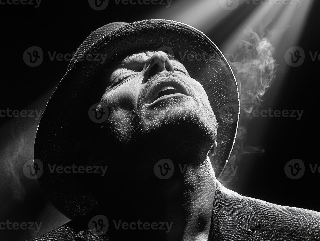 stand up comedian is captured mid performance eyes closed and head tilted back fully immersed in delivering jokes photo