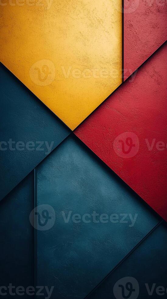 Abstract geometric shapes in red, yellow and blue with textured surface photo