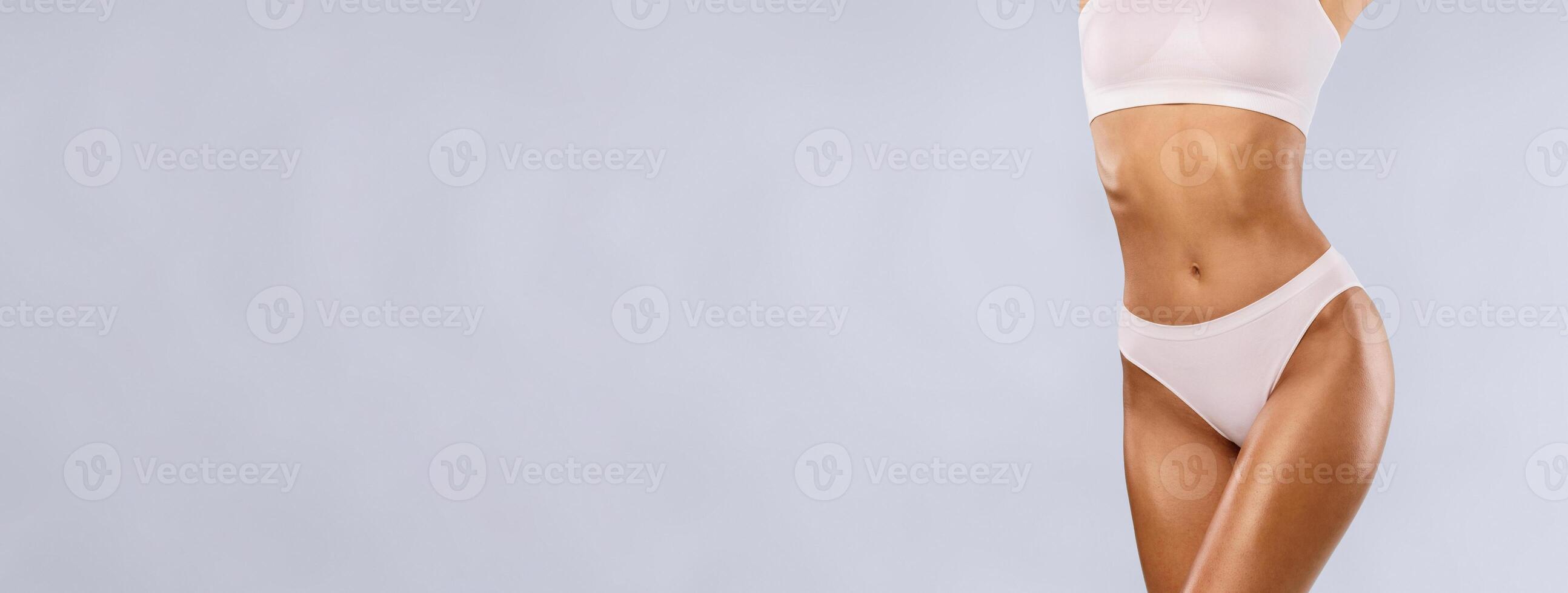 Love Yourself, Body Neutrality. Positive Slim Lady With Perfect Ideal Shape And Appearance Posing Isolated On Blue Studio Background, Lady In White Underwear Enjoying Herself, Free Copy Space, Banner photo