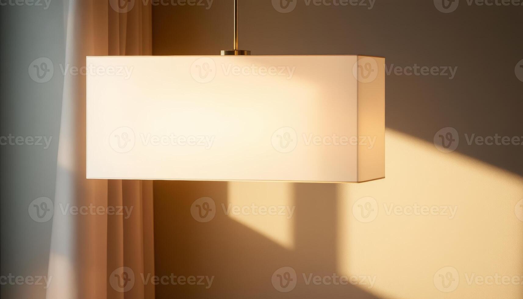 Rectangular Pendant Lamp Illuminating a Warm Wall with Soft Light and Shadow photo