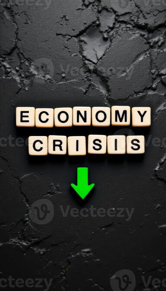 Economic Crisis on a Rough Textured Background with a Downward Green Arrow Depicting Recession photo