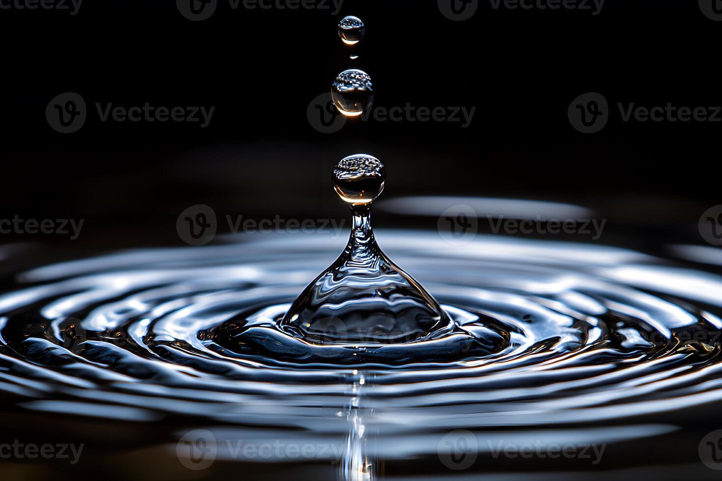 Tranquil Water Droplet Splash in Dark Minimalist Setting for Design and Art photo