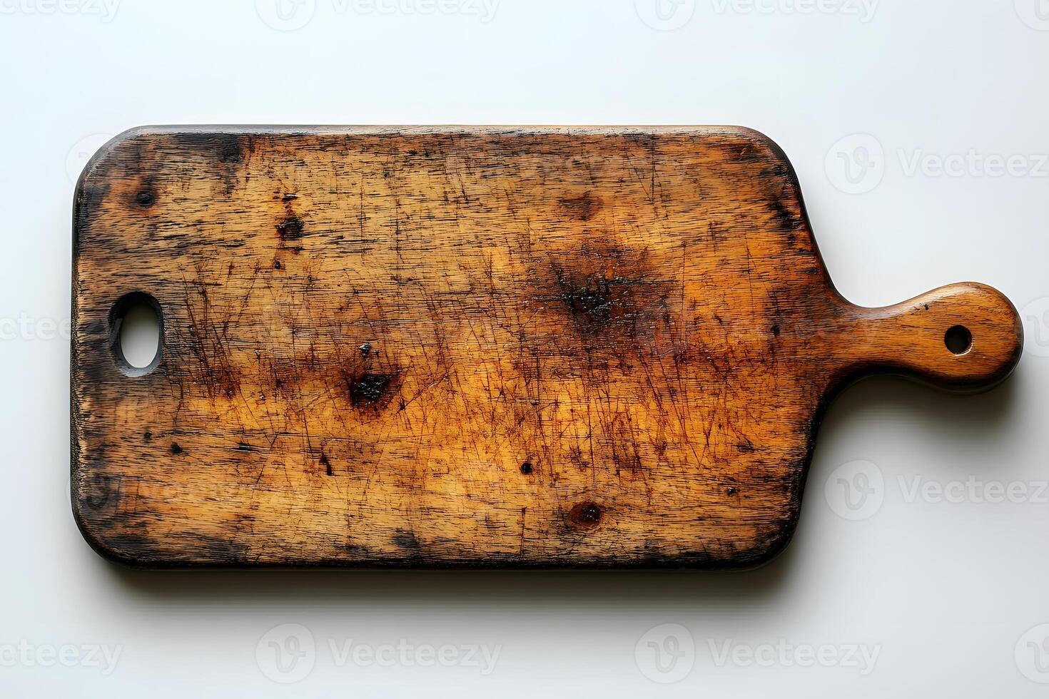 Vintage Wooden Cutting Board with Handle for Rustic Kitchen Decor and Culinary Design photo