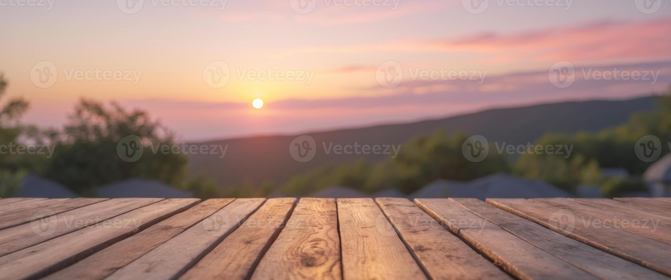 Wooden Table with Scenic Sunset View for Ideal Product Display and Presentation in Natural Setting. photo