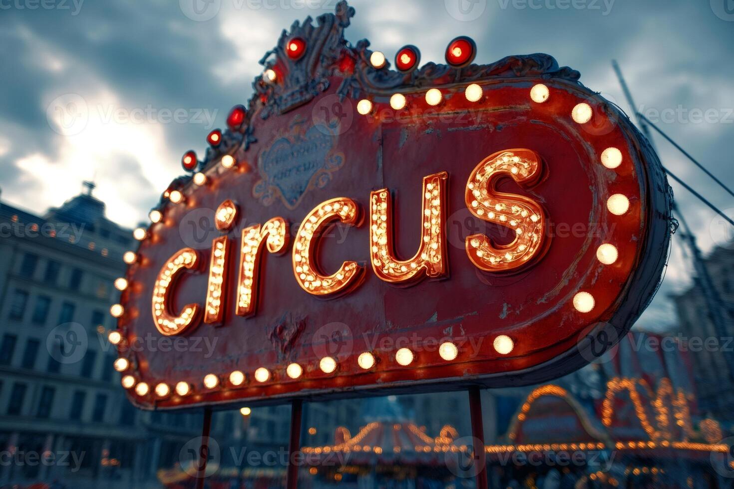 Illuminated circus sign announcing entertainment spectacle under dramatic sky photo