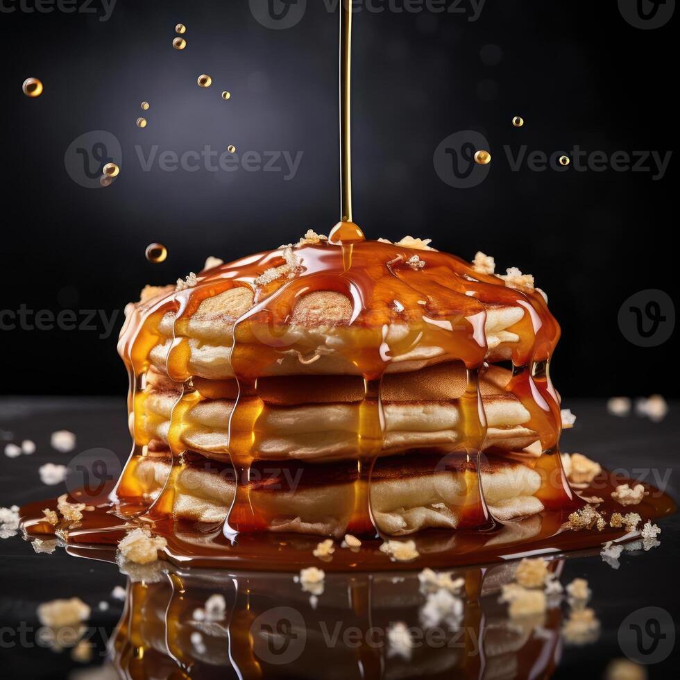 Stack of pancakes with syrup photo