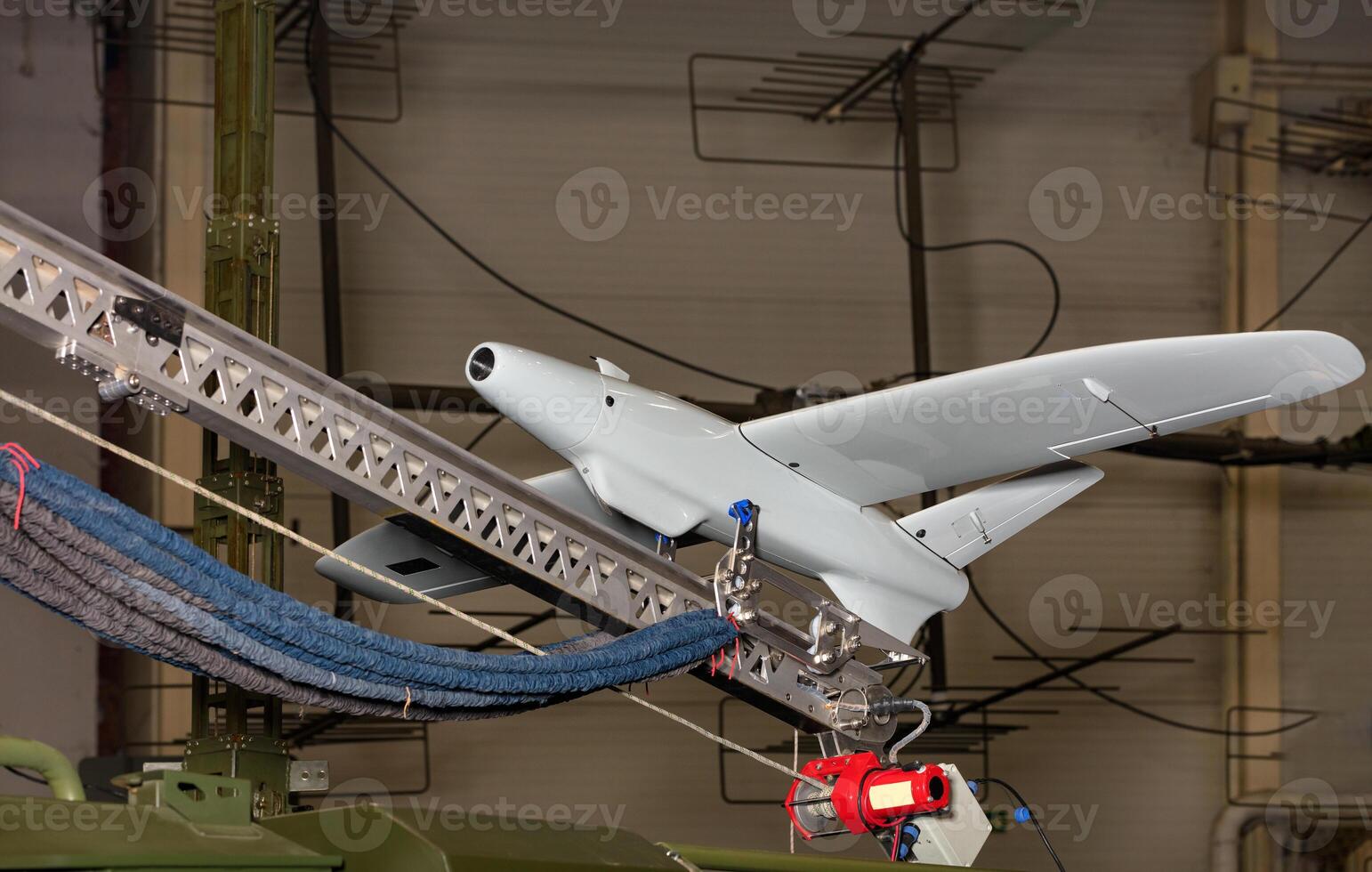 Shock drone with a combat head on a catapult to launch. photo