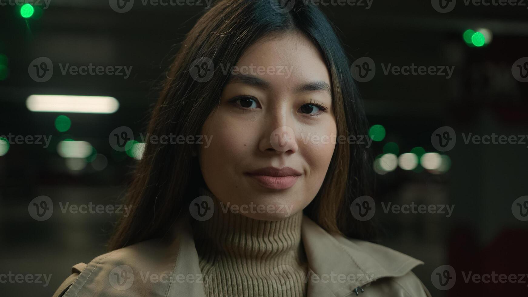 Close up portrait Asian oriental ethnic woman korean gen z 20s japanese chinese girl businesswoman smile looking to camera female customer beautiful lady driver car owner posing in underground parking photo