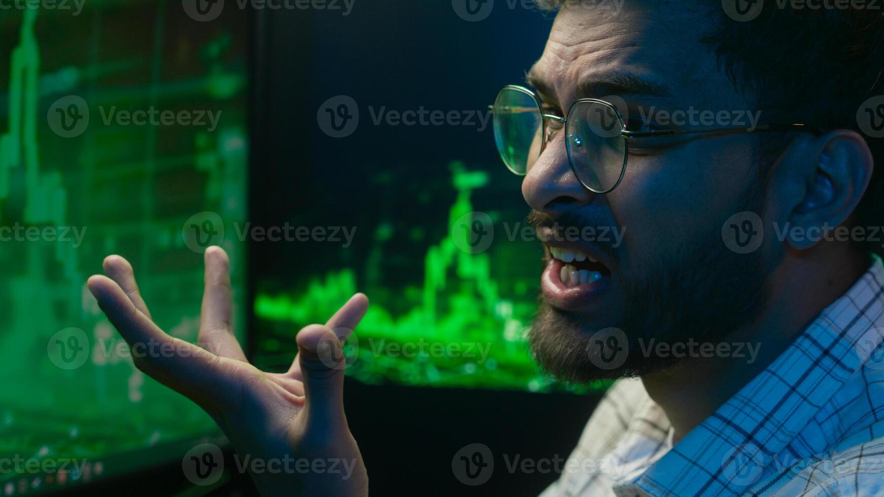Displeased Indian Arabian man broker guy programming code cryptocurrency computer trading problem male angry programmer technology error coder crash failure chart cybersecurity Bitcoin web pc nervous photo
