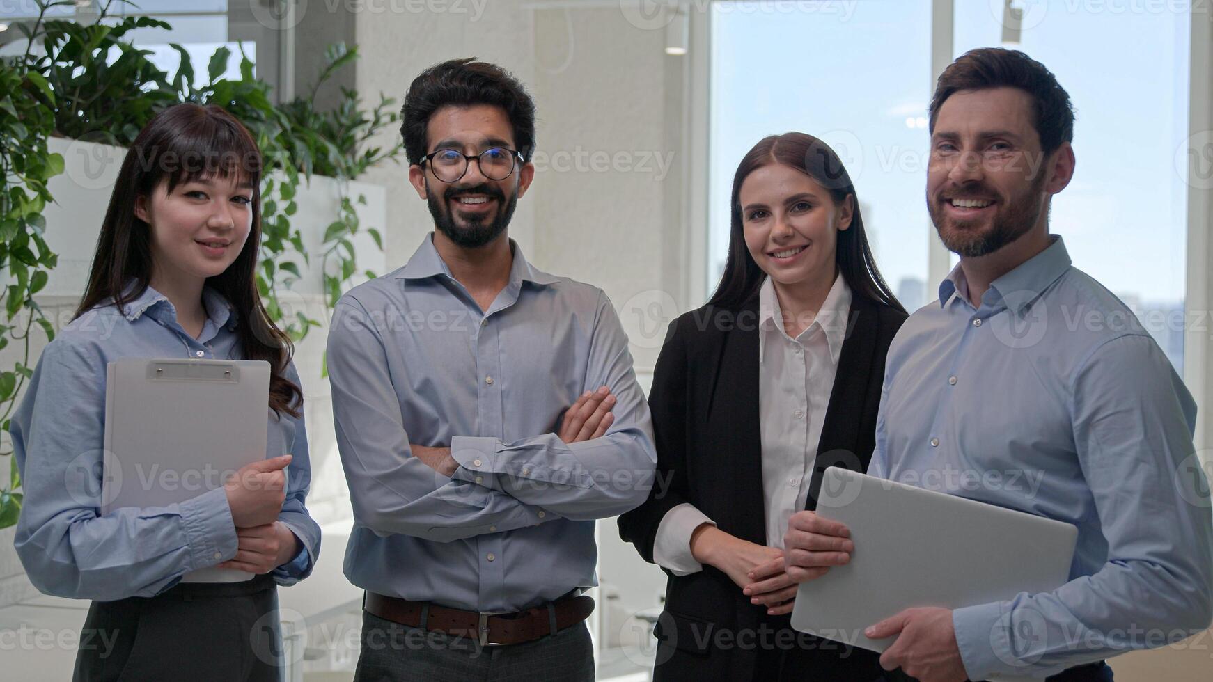 Successful business team portrait diverse office co-workers multiracial colleagues group of businesswomen businessmen multi ethnic women men smiling together corporate leadership professional teamwork photo