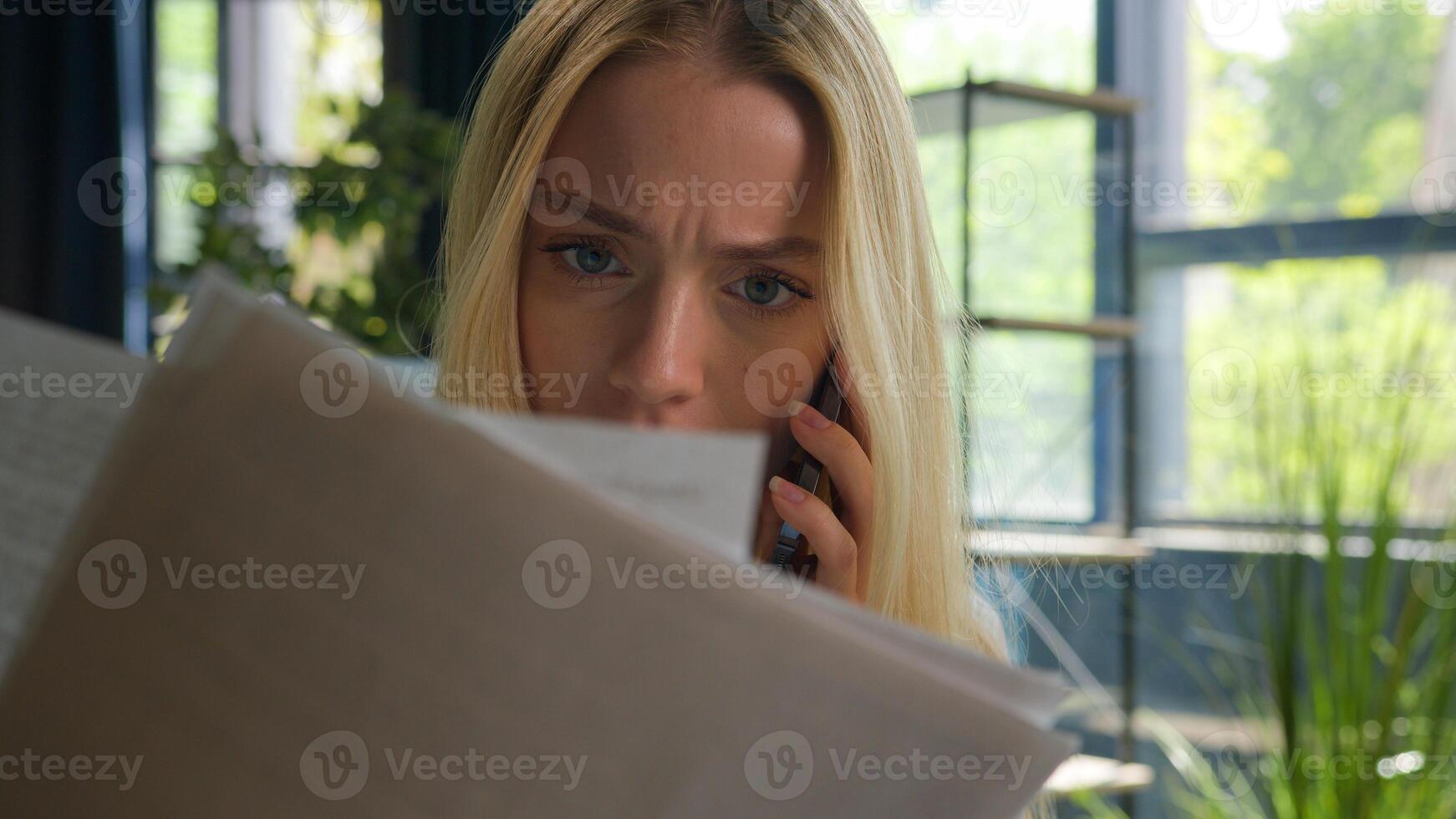 Annoyed angry stressed Caucasian business woman entrepreneur mad irritated shout at phone in office female businesswoman solve documents problem financial mistake arguing scream finishing mobile call photo