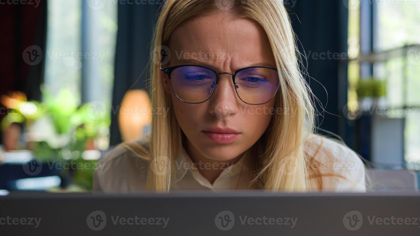 Caucasian female business girl manager worker ceo executive businesswoman at office desk focused woman working typing project on laptop computer online work project startup chatting with clients email photo