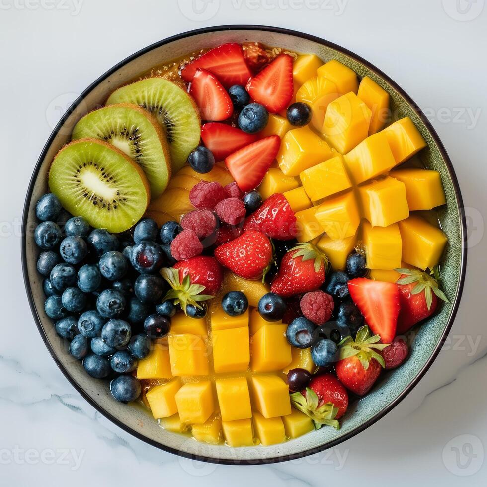 A round bowl with cut fruits white background product image photo