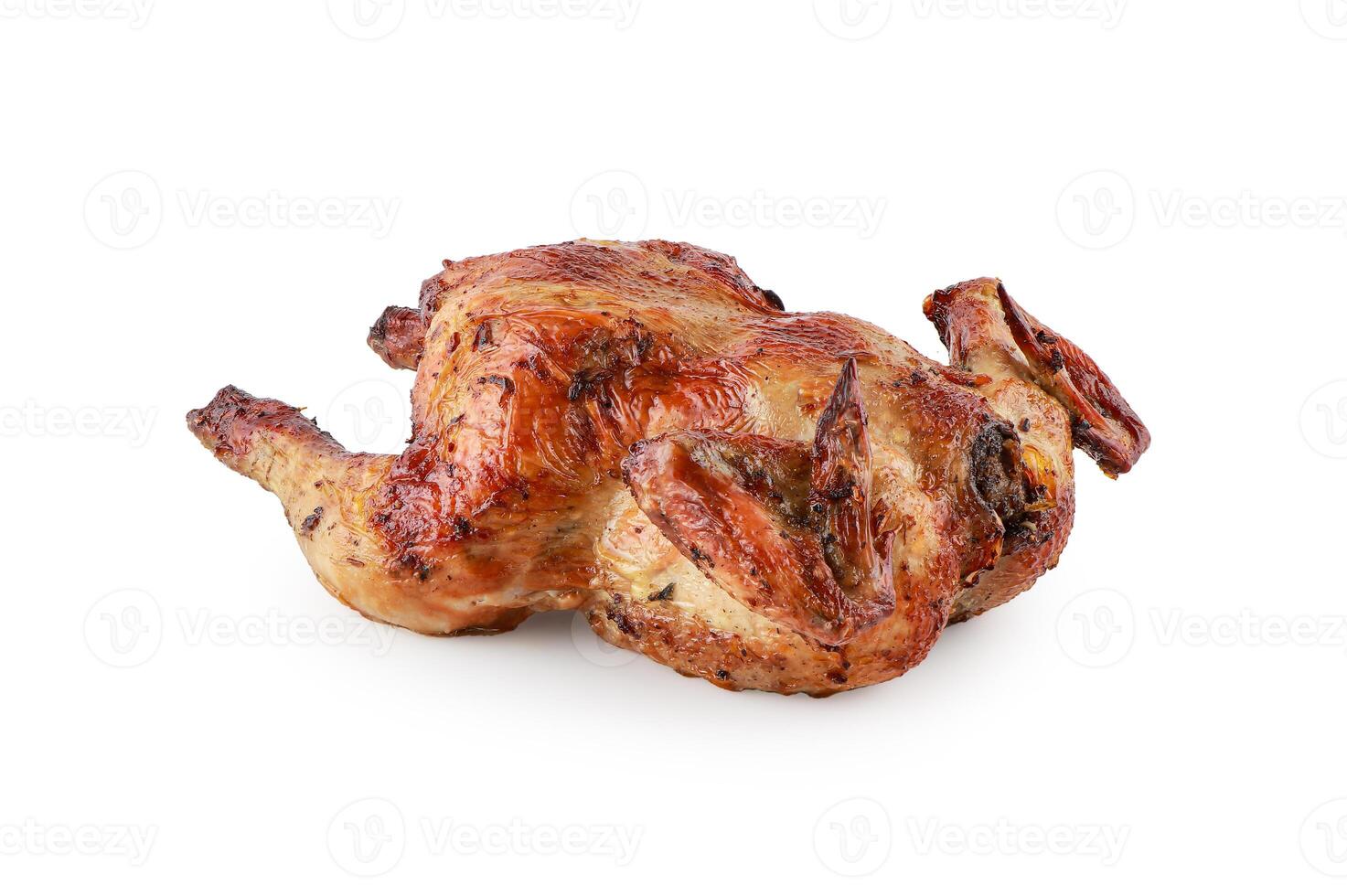 Grilled chicken delicious ready to eat served on a aluminium foil isolated on white background with clipping path, Baked whole chicken. photo