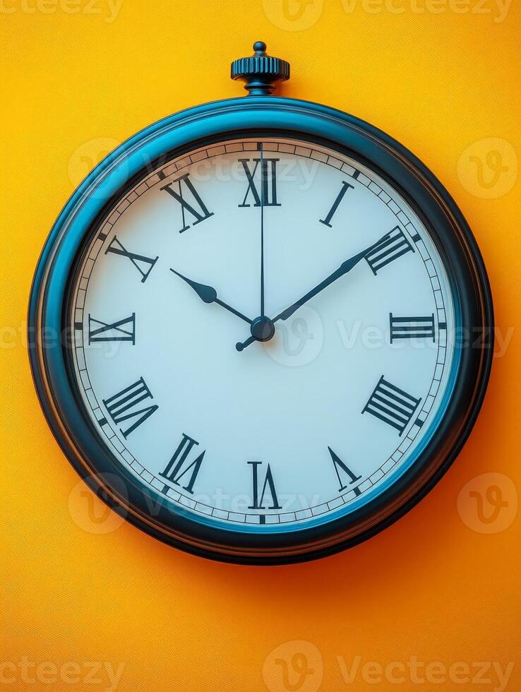 A round wall clock displaying Roman numerals against a vibrant yellow background. photo