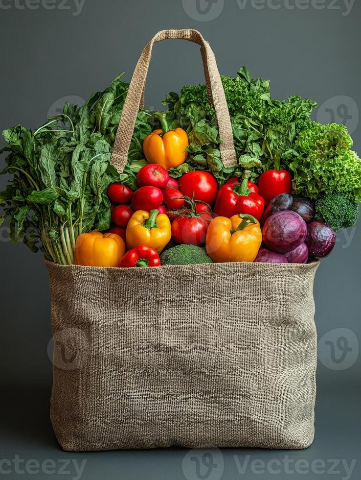 A burlap bag filled with fresh vegetables, showcasing a variety of colors and types. photo