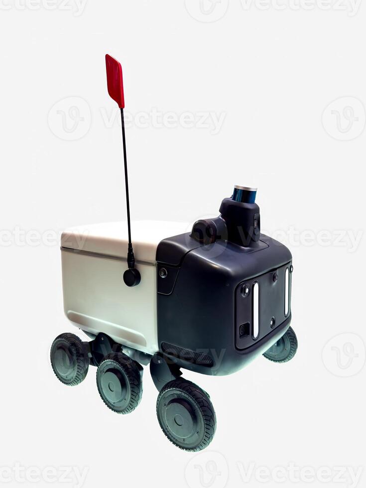 A compact autonomous delivery robot featuring six wheels, a camera, and a red safety flag. Designed for modern urban delivery solutions, it showcases advanced robotic technology and mobility photo
