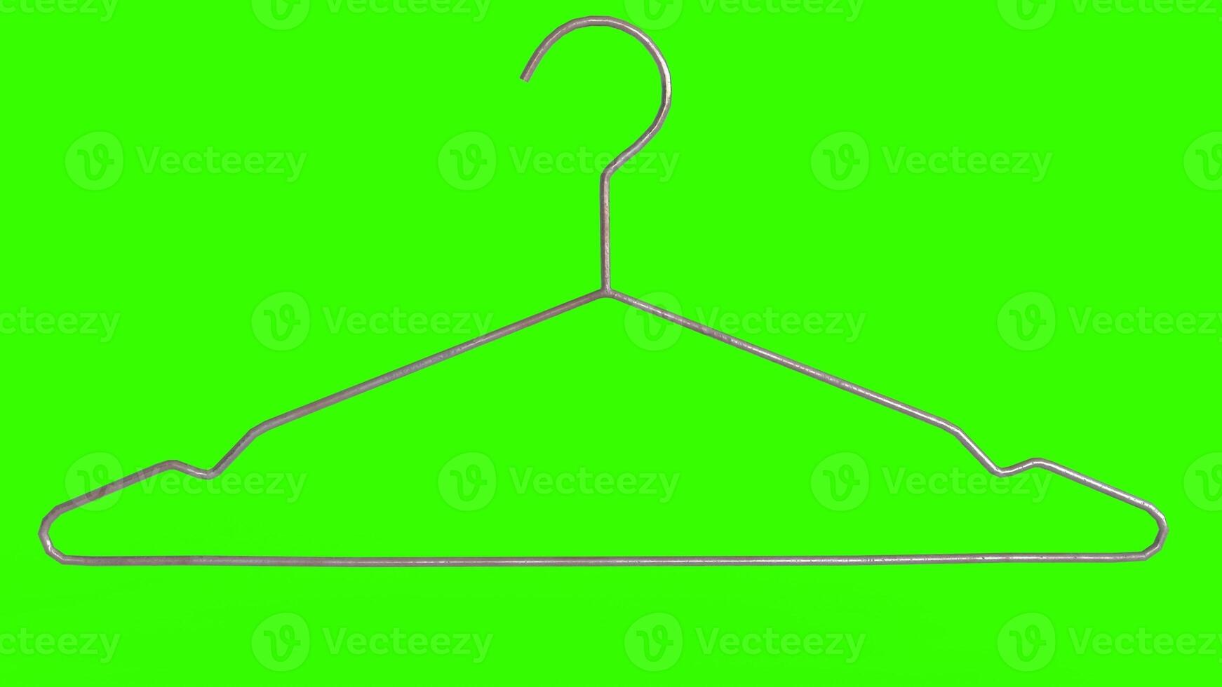 clothes hangers with green background 1 photo