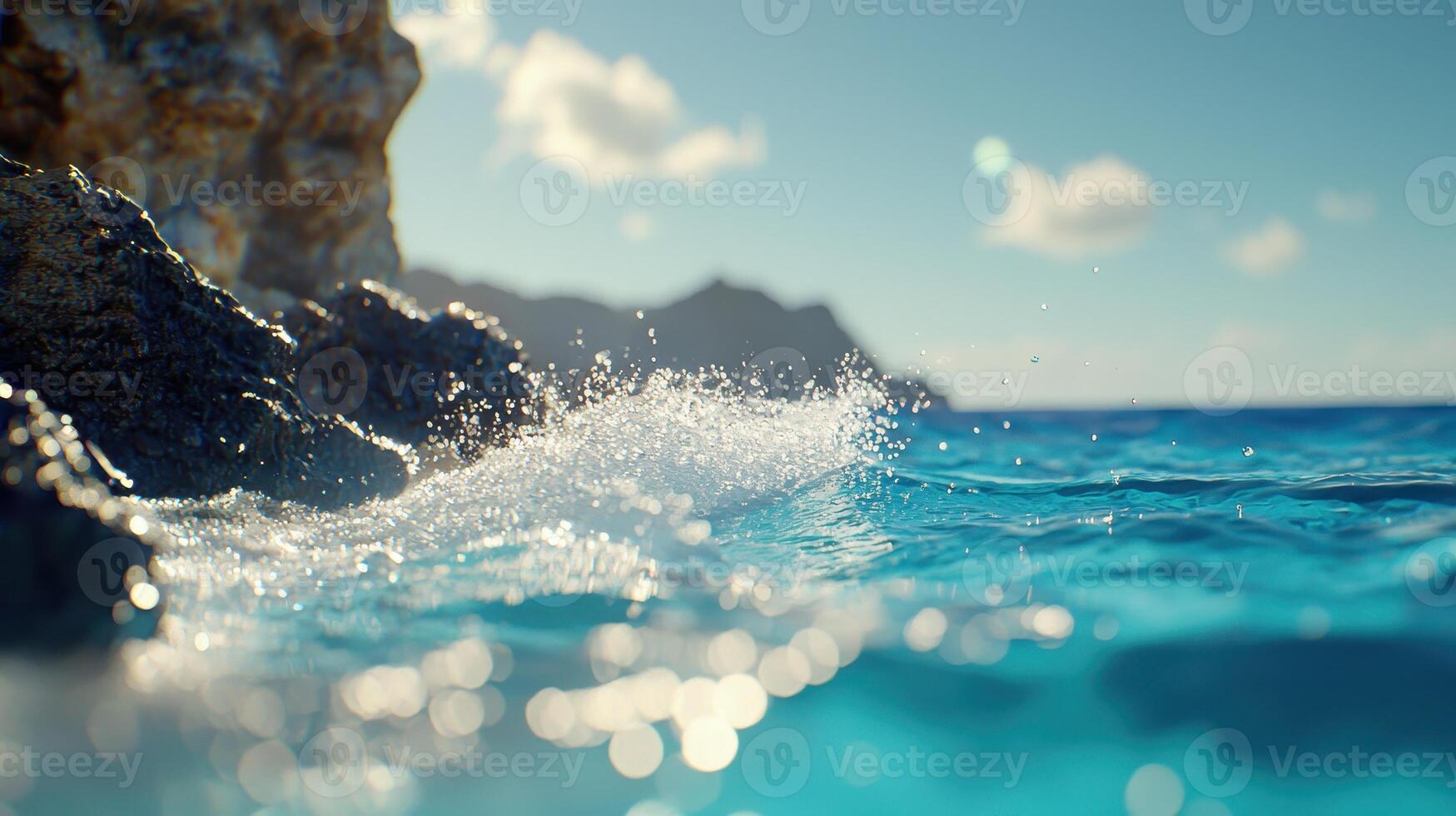 Crystal Clear Ocean Water Splashing Against Rocky Shore Summer Seascape photo