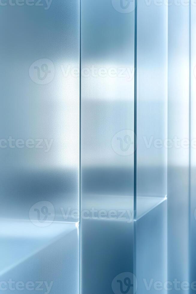 Frosted glass panels with a light blue tint create a serene environment, casting soft light patterns on a smooth surface, providing ample negative space for creative text overlay photo