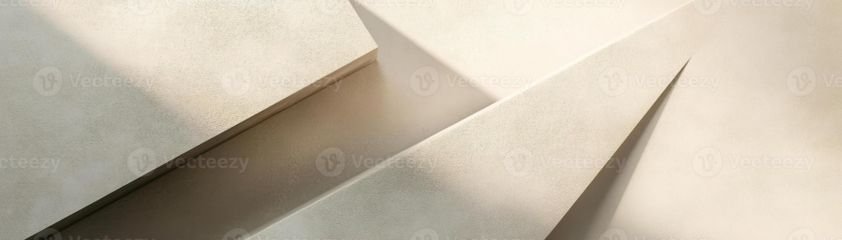 Overlapping concrete slabs create a calming and modern backdrop featuring smooth textures and subtle shadows against a soft beige hue, providing ample space for text overlay photo