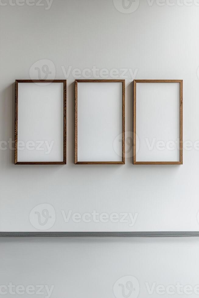 Symmetrically arranged wooden frames of different sizes adorn a light gray wall, creating a visually appealing minimalist gallery. The design leaves ample room for personalized artwork photo